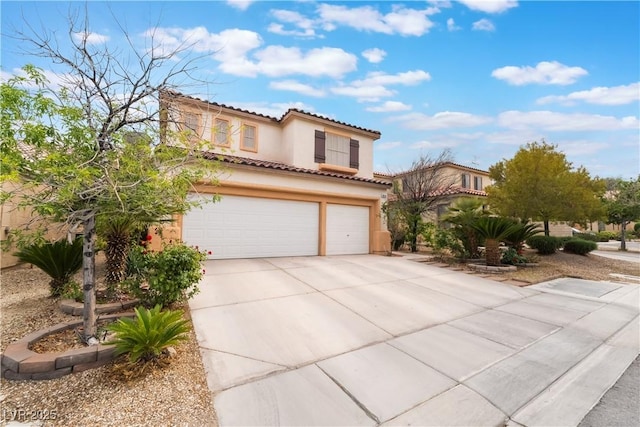 mediterranean / spanish home featuring a garage, stucco siding, driveway, and a tile roof