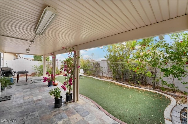 view of patio featuring a fenced backyard