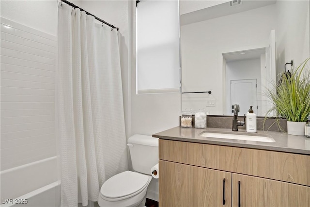 bathroom with vanity, toilet, and shower / bath combination with curtain