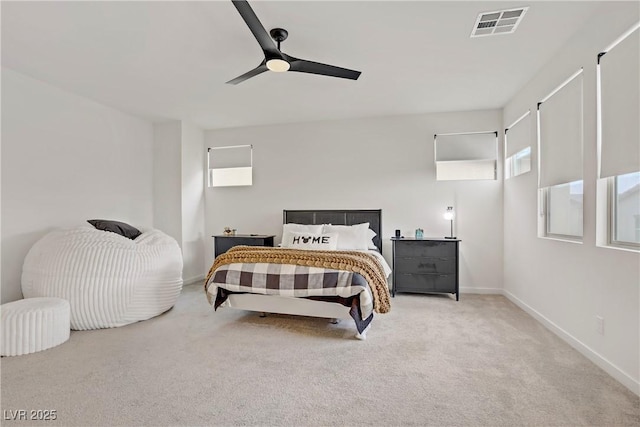 bedroom featuring ceiling fan, carpet floors, baseboards, and visible vents