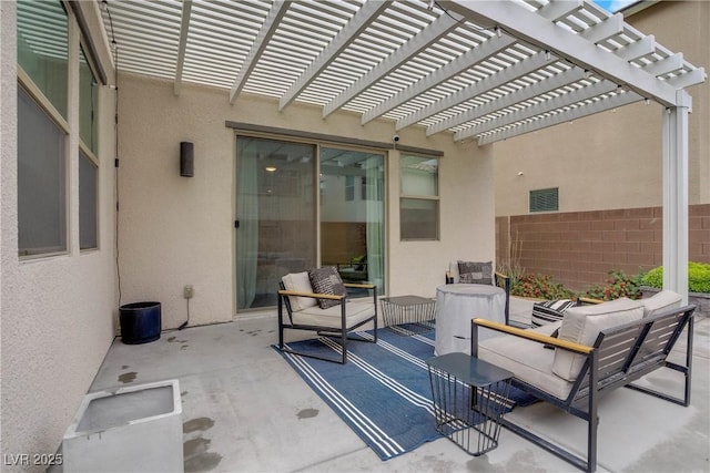 view of patio / terrace featuring fence and a pergola