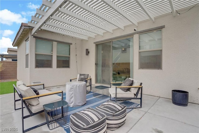 view of patio / terrace featuring outdoor lounge area, fence, and a pergola
