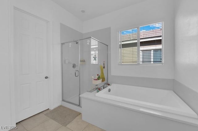 9590 Smiley Creek St, Las Vegas, NV 89178 - bathroom with a shower stall, tile patterned flooring, and a bath