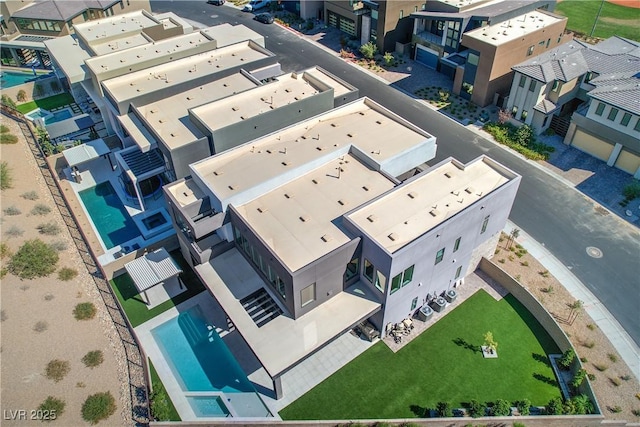 drone / aerial view with a residential view