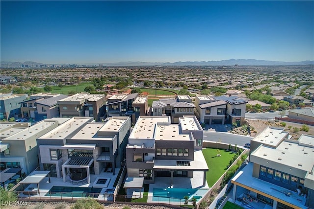 bird's eye view with a mountain view and a residential view