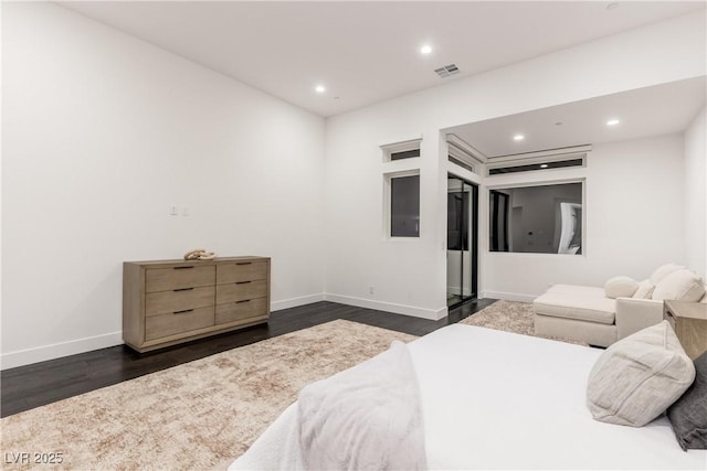 bedroom with dark wood-type flooring, visible vents, recessed lighting, and baseboards
