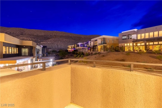 balcony featuring a mountain view