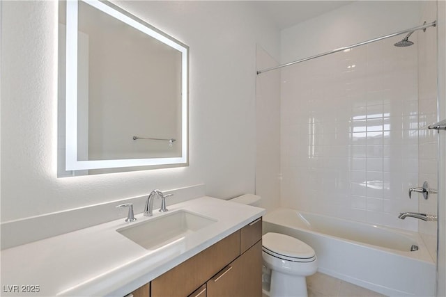 bathroom featuring bathing tub / shower combination, toilet, and vanity