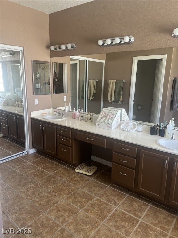 6596 Secluded Ave, Las Vegas, NV 89110 - full bathroom with vanity and tile patterned flooring