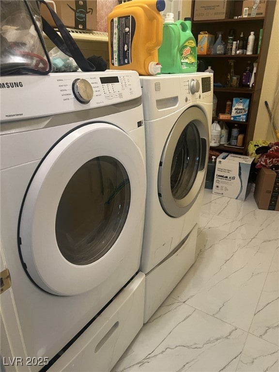 6596 Secluded Ave, Las Vegas, NV 89110 - laundry room featuring washing machine and dryer and marble finish flooring