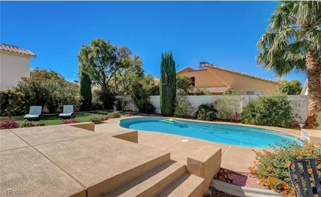 view of pool with a fenced in pool, a patio area, and a fenced backyard