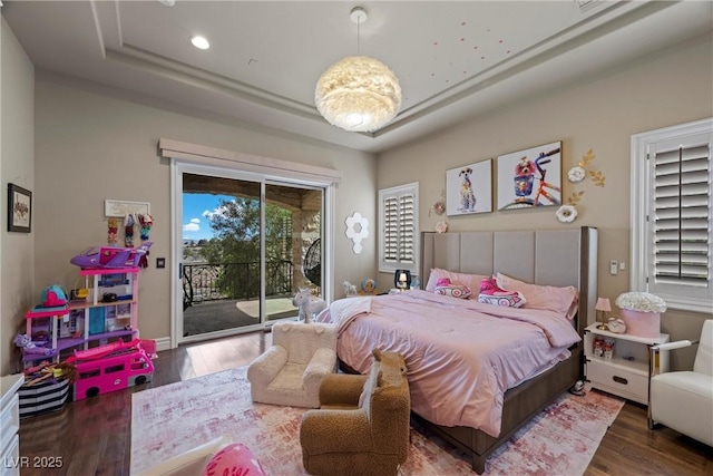 9301 Verlaine Ct, Las Vegas, NV 89145 - bedroom with a tray ceiling, access to outside, wood finished floors, and recessed lighting