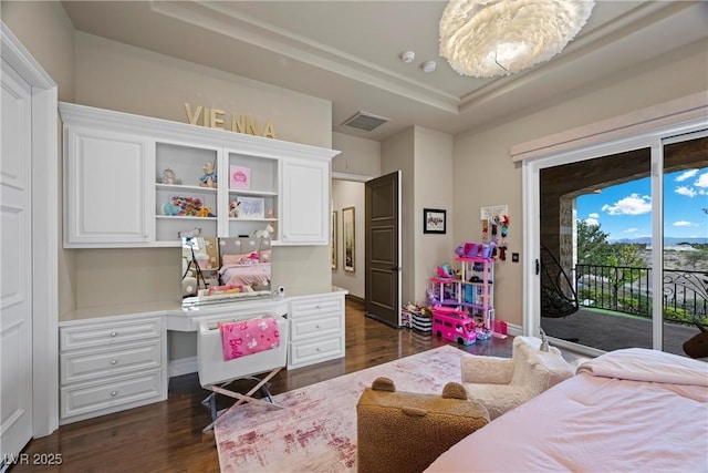 9301 Verlaine Ct, Las Vegas, NV 89145 - bedroom with built in desk, visible vents, access to exterior, and dark wood-style floors
