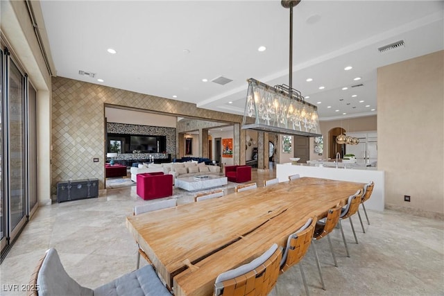 9301 Verlaine Ct, Las Vegas, NV 89145 - dining space with recessed lighting, wallpapered walls, visible vents, and an accent wall