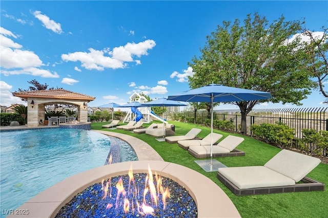 9301 Verlaine Ct, Las Vegas, NV 89145 - view of pool with an outdoor fire pit, a gazebo, a fenced in pool, and fence