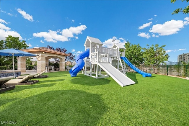 9301 Verlaine Ct, Las Vegas, NV 89145 - view of play area with fence and a lawn