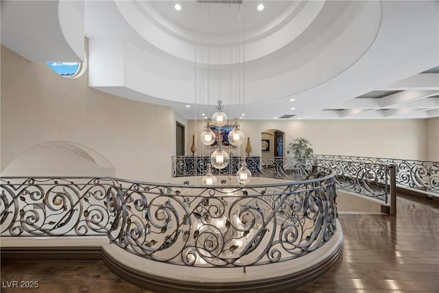 9301 Verlaine Ct, Las Vegas, NV 89145 - hall featuring wood finished floors, a towering ceiling, and recessed lighting