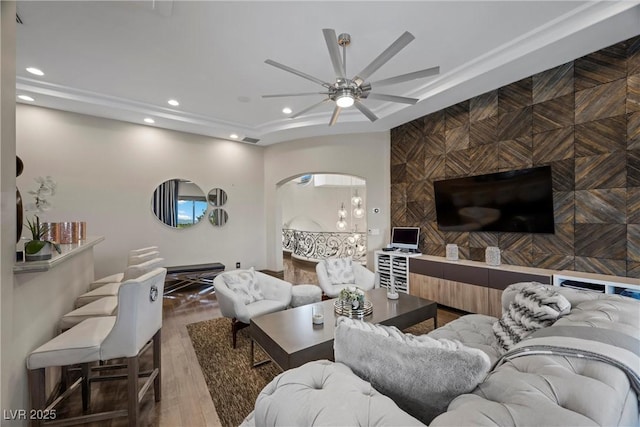 9301 Verlaine Ct, Las Vegas, NV 89145 - living room featuring wood finished floors, visible vents, recessed lighting, arched walkways, and a ceiling fan