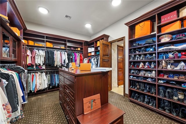 9301 Verlaine Ct, Las Vegas, NV 89145 - walk in closet featuring dark colored carpet and visible vents