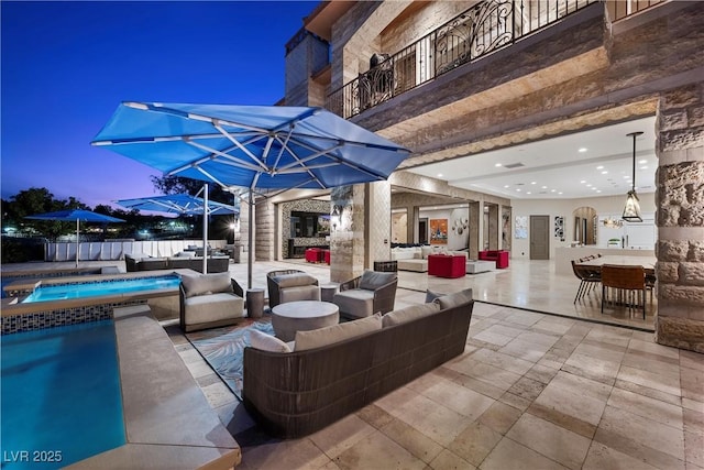 9301 Verlaine Ct, Las Vegas, NV 89145 - view of patio featuring an in ground hot tub, an outdoor living space, outdoor dining space, and a fenced in pool