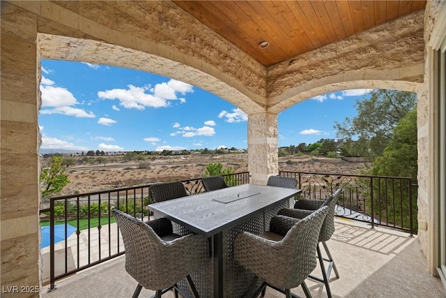 9301 Verlaine Ct, Las Vegas, NV 89145 - view of patio featuring a balcony and outdoor dining space