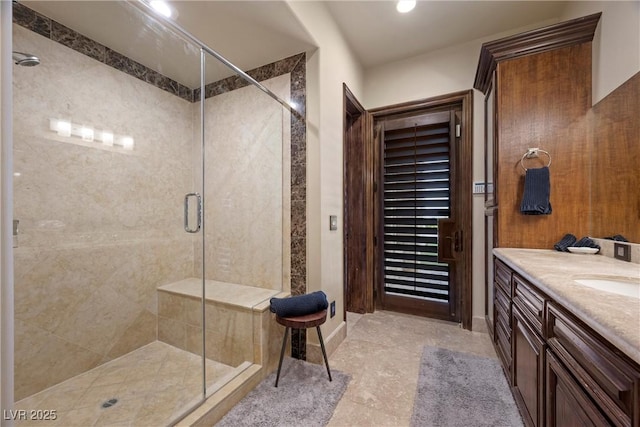 9301 Verlaine Ct, Las Vegas, NV 89145 - full bath featuring a stall shower, baseboards, and vanity