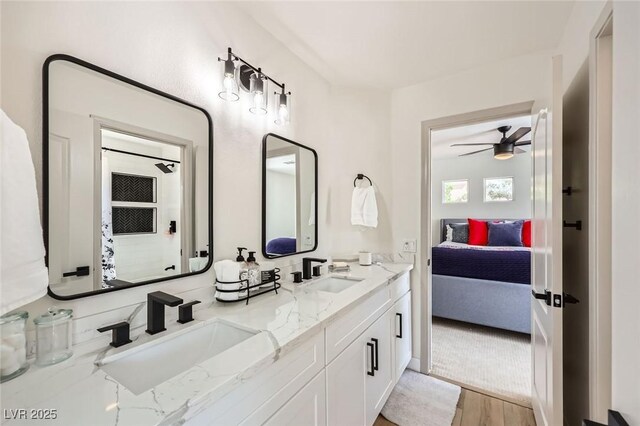 150 Wentworth Dr, Henderson, NV 89074 - ensuite bathroom featuring a ceiling fan, double vanity, ensuite bathroom, and a sink