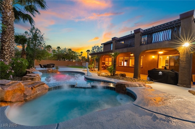 4200 Scott Peak Ct, Las Vegas, NV 89129 - view of swimming pool featuring a patio area, a grill, and a pool with connected hot tub