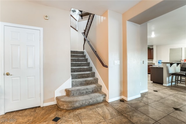 4200 Scott Peak Ct, Las Vegas, NV 89129 - staircase featuring tile patterned flooring and baseboards