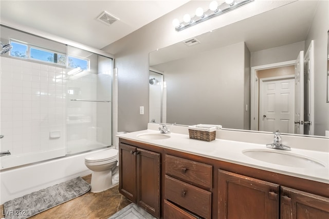 4200 Scott Peak Ct, Las Vegas, NV 89129 - bathroom with double vanity, toilet, bath / shower combo with glass door, and tile patterned flooring