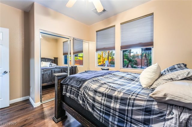 4200 Scott Peak Ct, Las Vegas, NV 89129 - bedroom featuring dark wood-style floors, baseboards, and ceiling fan
