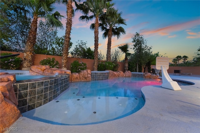 4200 Scott Peak Ct, Las Vegas, NV 89129 - view of pool with a jacuzzi, fence, and a water slide
