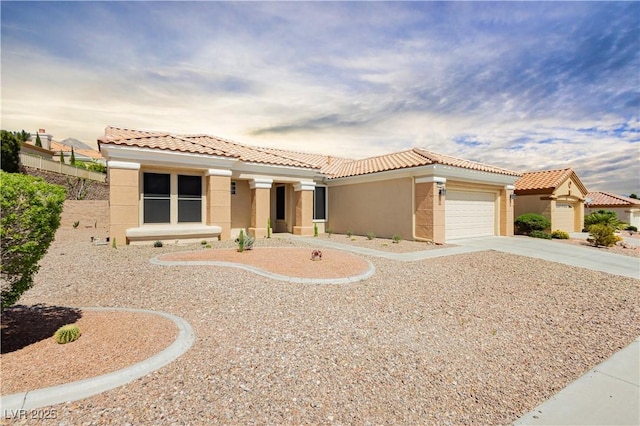 2205 Beacon Ridge Dr, Las Vegas, NV 89134 - mediterranean / spanish home with stucco siding, a tiled roof, driveway, and a garage