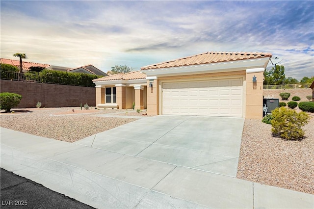 2205 Beacon Ridge Dr, Las Vegas, NV 89134 - mediterranean / spanish-style house with stucco siding, driveway, a tiled roof, and a garage
