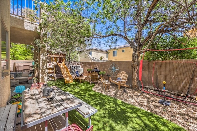 view of yard with an outdoor hangout area and a fenced backyard