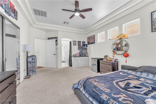 465 Indigo Springs St, Henderson, NV 89014 - bedroom featuring a raised ceiling, visible vents, carpet, and connected bathroom