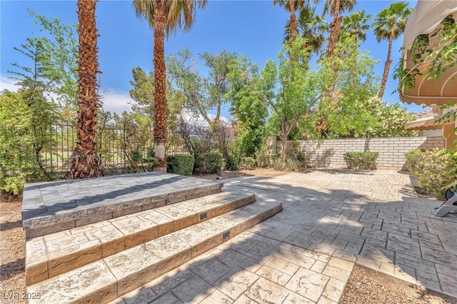 465 Indigo Springs St, Henderson, NV 89014 - exterior space with a fenced backyard and a patio