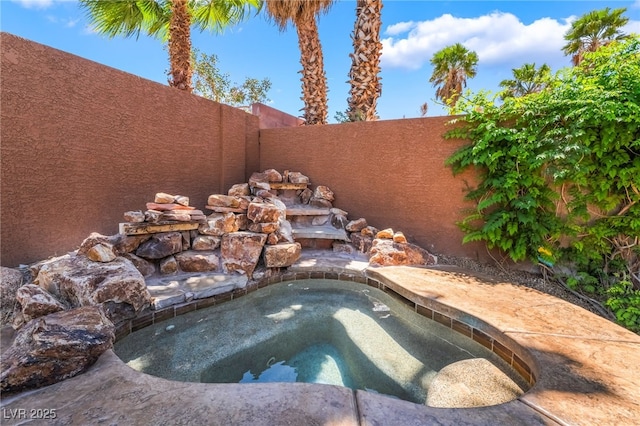 7526 Gossamer Wind St, Las Vegas, NV 89139 - view of swimming pool featuring a fenced backyard and an in-ground hot tub