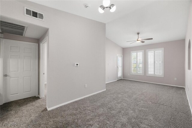 10001 Peace Way Unit 2228, Las Vegas, NV 89147 - spare room featuring carpet, vaulted ceiling, baseboards, a ceiling fan, and a chandelier