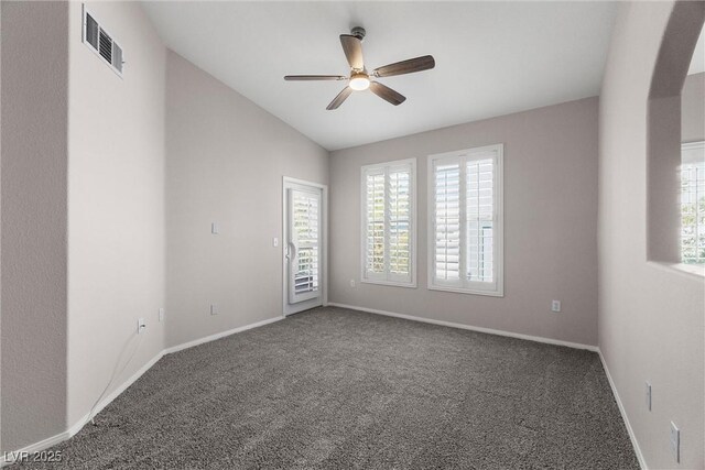 10001 Peace Way Unit 2228, Las Vegas, NV 89147 - carpeted spare room with a ceiling fan, baseboards, vaulted ceiling, and arched walkways