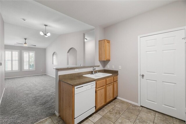 10001 Peace Way Unit 2228, Las Vegas, NV 89147 - kitchen featuring dishwasher, a sink, baseboards, lofted ceiling, and ceiling fan