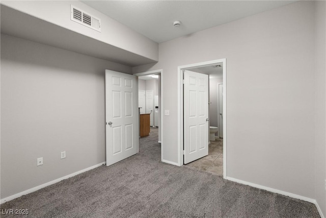 10001 Peace Way Unit 2228, Las Vegas, NV 89147 - unfurnished bedroom featuring carpet and baseboards