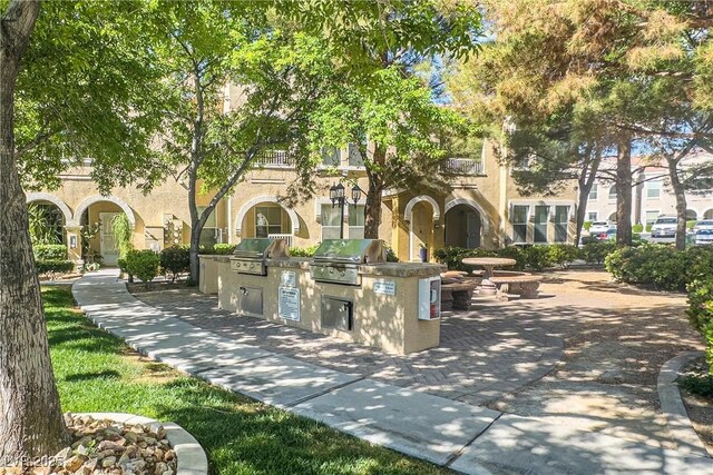 10001 Peace Way Unit 2228, Las Vegas, NV 89147 - view of home's community featuring exterior kitchen and a patio