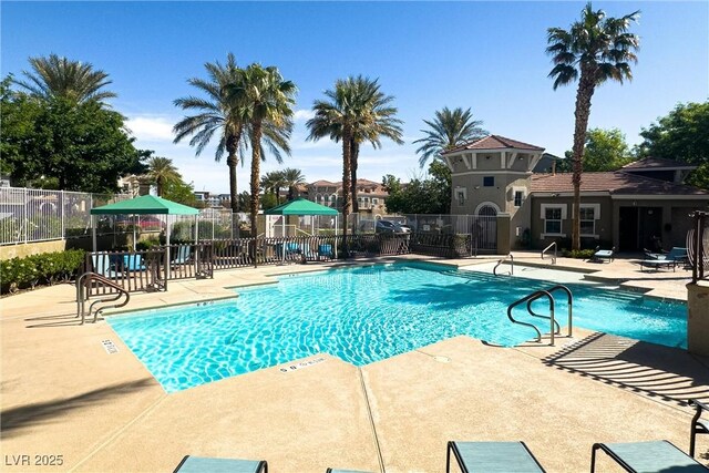 10001 Peace Way Unit 2228, Las Vegas, NV 89147 - community pool featuring a patio