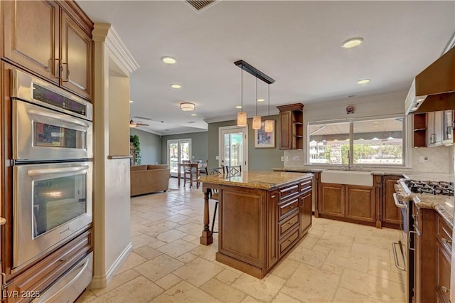 2708 Port Of Call Dr, Las Vegas, NV 89128 - kitchen with open shelves, stainless steel appliances, stone tile floors, recessed lighting, and ornamental molding