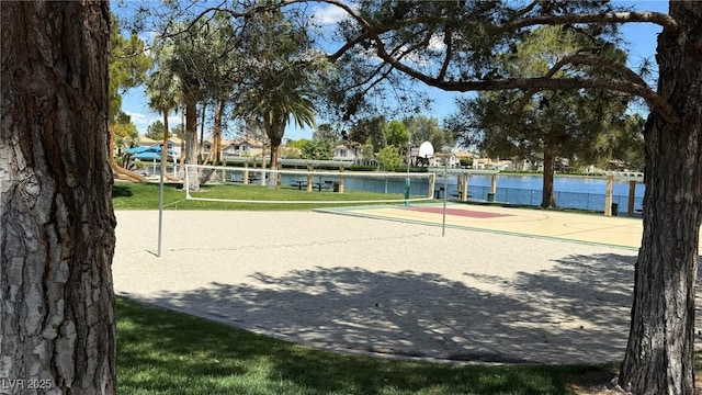 2708 Port Of Call Dr, Las Vegas, NV 89128 - view of home's community with community basketball court, volleyball court, and a water view