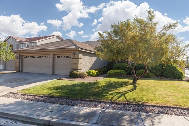 240 Jumping Springs Pl, Henderson, NV 89012 - view of front facade featuring an attached garage, driveway, stucco siding, and a front yard