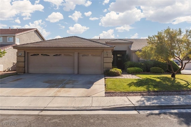 240 Jumping Springs Pl, Henderson, NV 89012 - view of front of property featuring concrete driveway, a garage, a front yard, a tiled roof, and stucco siding