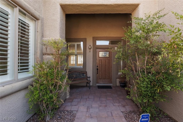240 Jumping Springs Pl, Henderson, NV 89012 - doorway to property with stucco siding