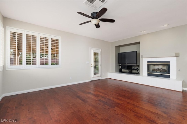 240 Jumping Springs Pl, Henderson, NV 89012 - unfurnished living room with wood finished floors, a ceiling fan, and baseboards